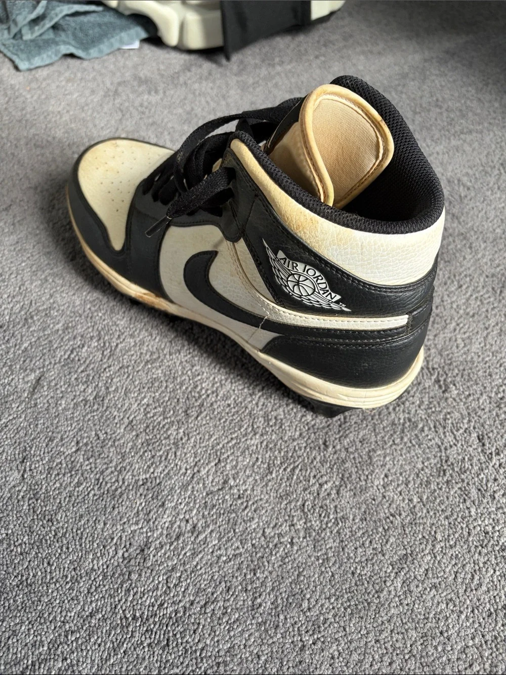 Nike Men’s Black and White High-Top Athletic Cleats